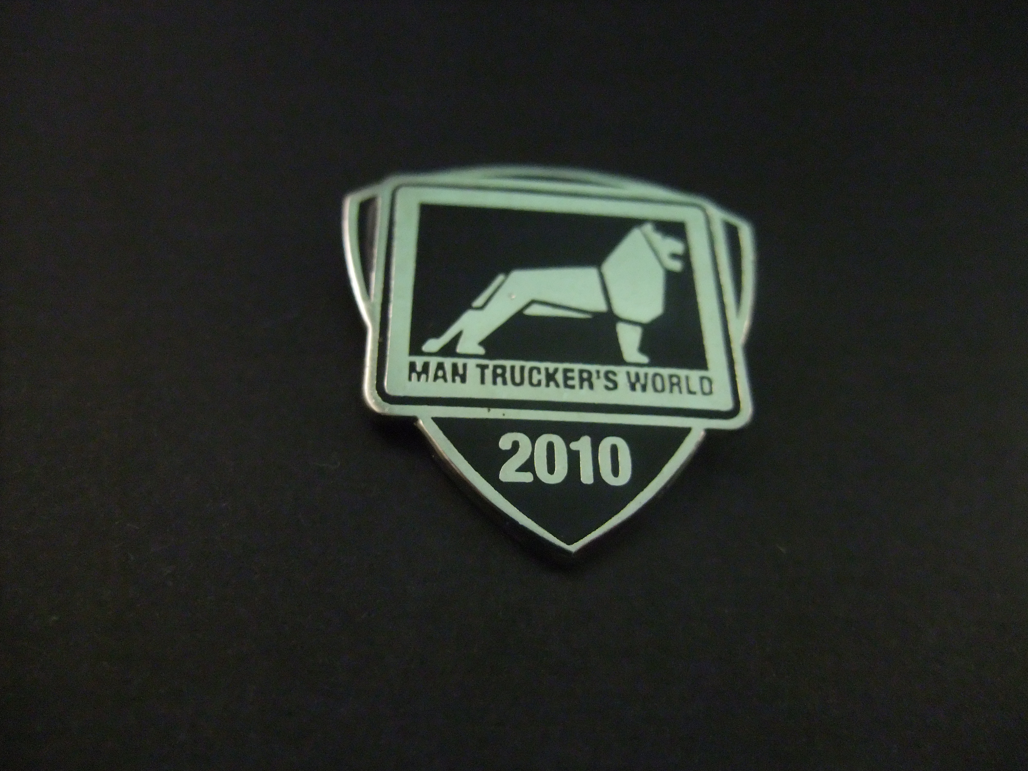 MAN Trucker's World 2010 zilverkleurig met logo